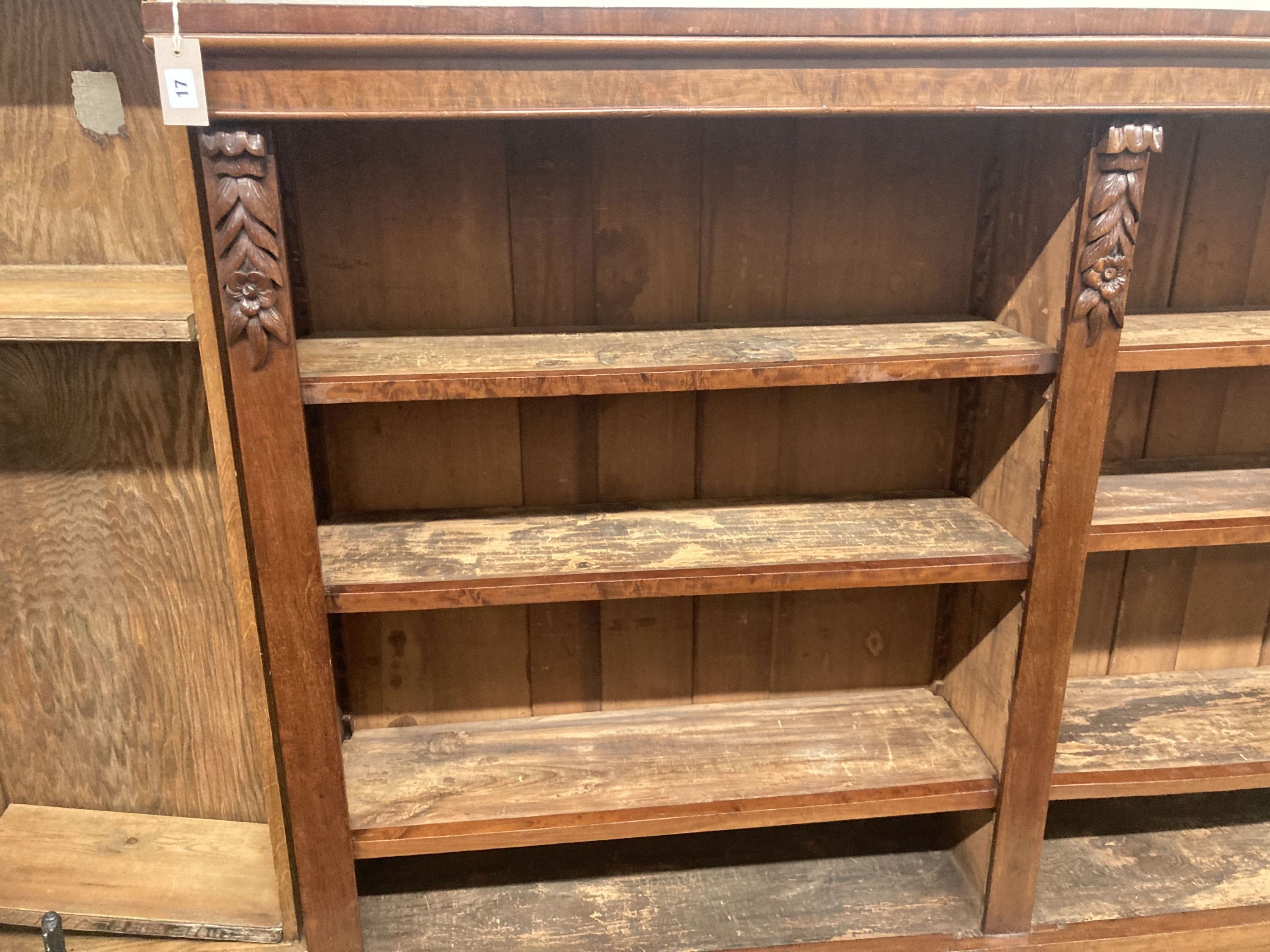 A late Victorian banded mahogany open bookcase, length 183cm, depth 33cm, height 123cm